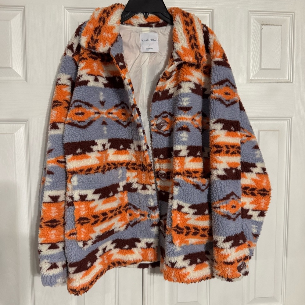 Khaki + blue brand Aztec print winter jacket, never worn, size large.